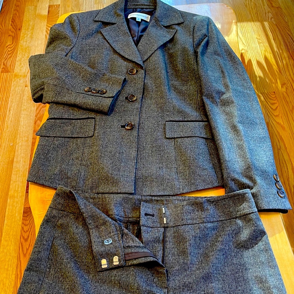 Fine plaids brown suit with soft wool like fabric. Like new. slenderizing cut.